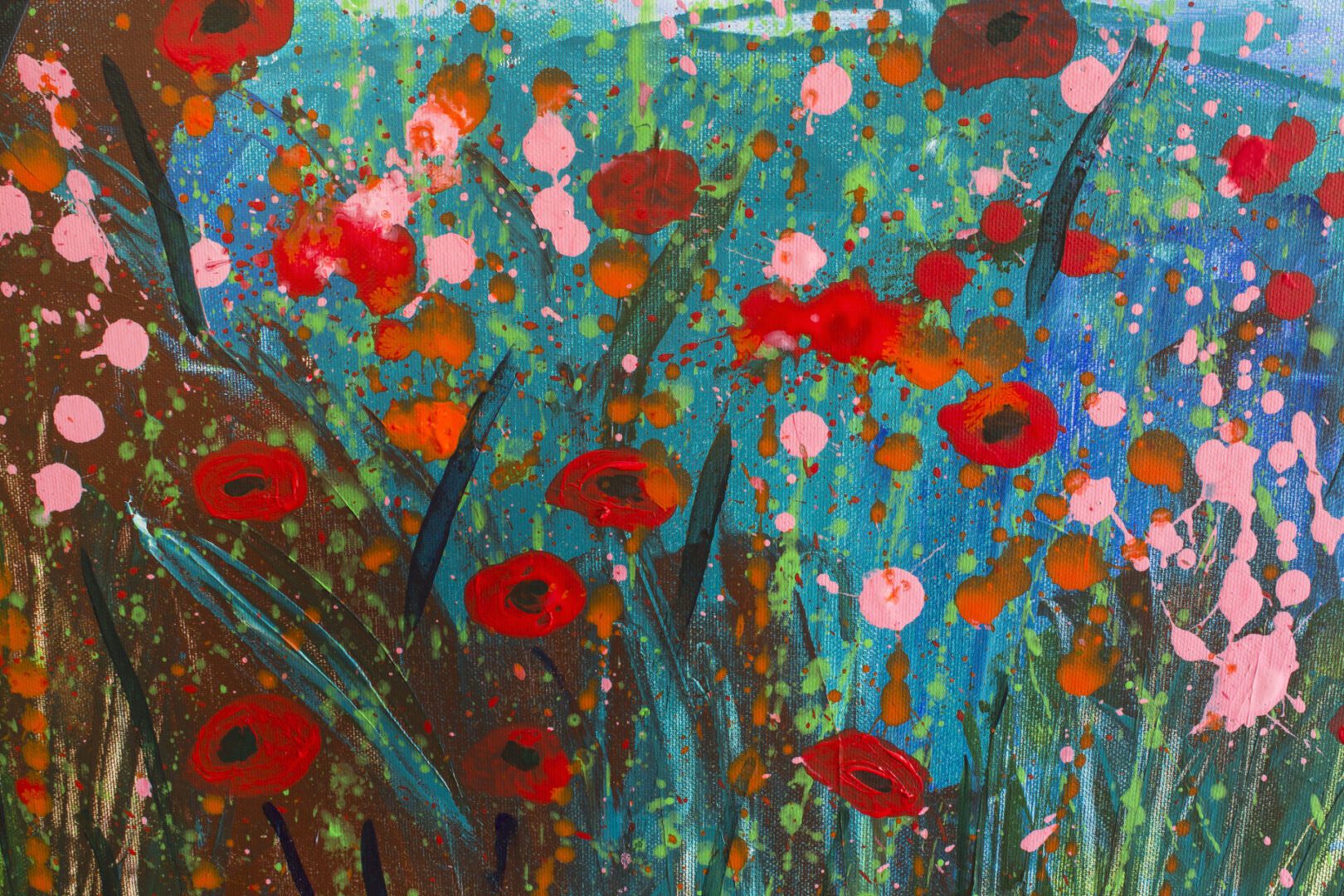 Abstract painting with vibrant red and pink flowers on a blue background.