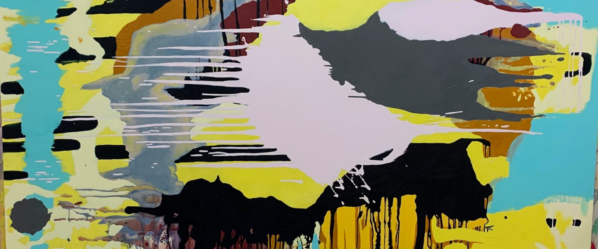 Abstract colorful paint splatter on canvas